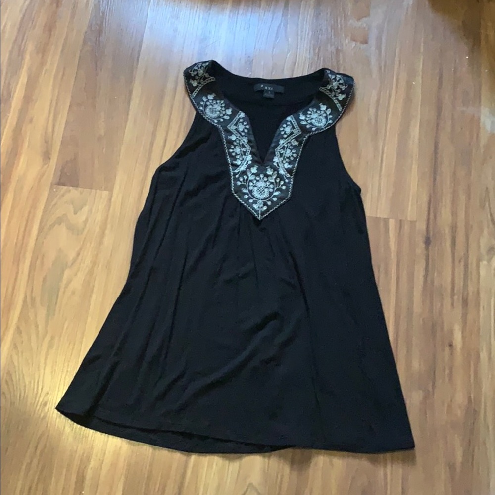 Black sleeveless blouse